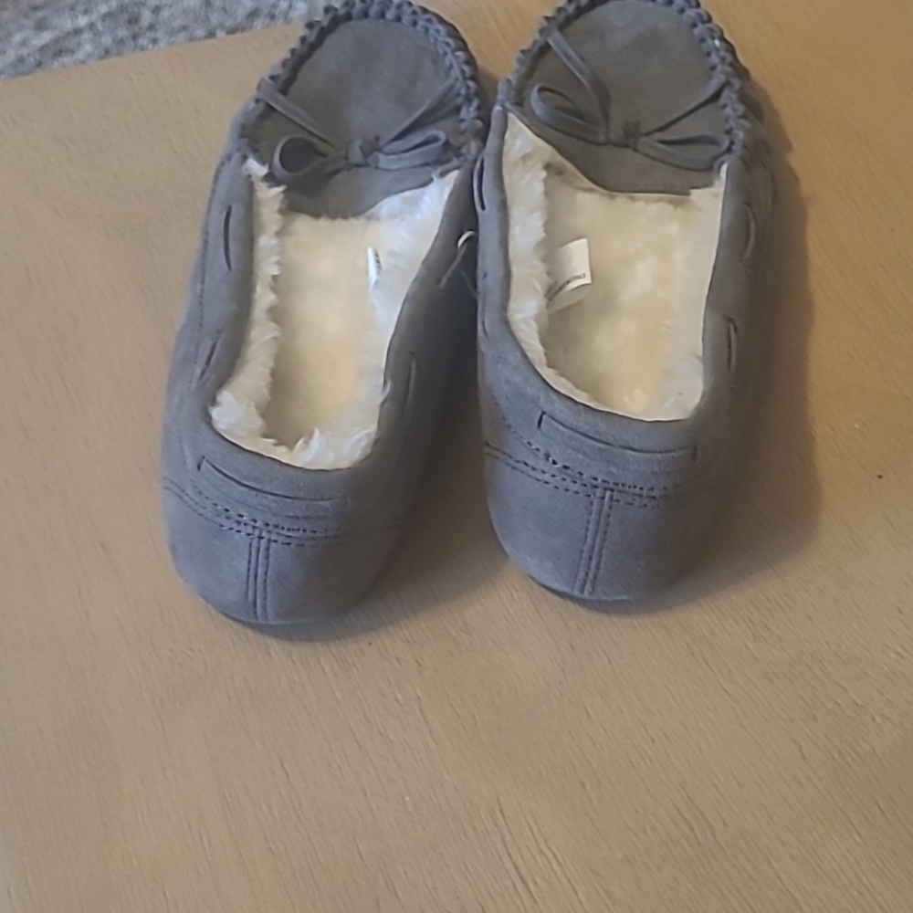 Gray little boy slide in